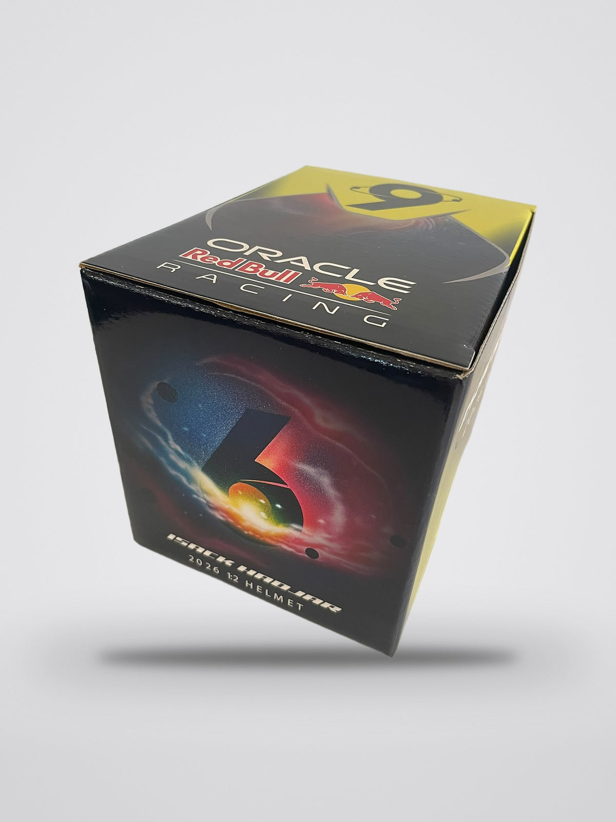 Isack Hadjar 2026 season mini helmet, 1:2 scale, the Oracle Red Bull Racing box with the No. 6