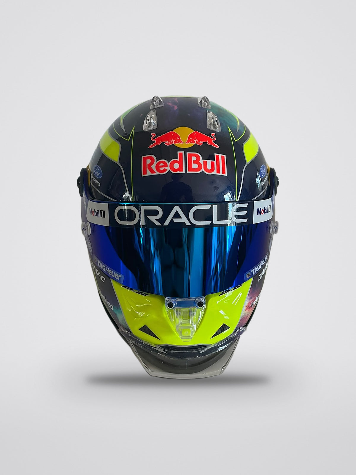 Isack Hadjar signed 2026 season mini helmet, 1:2 scale, seen from the front, iridium blue visor down