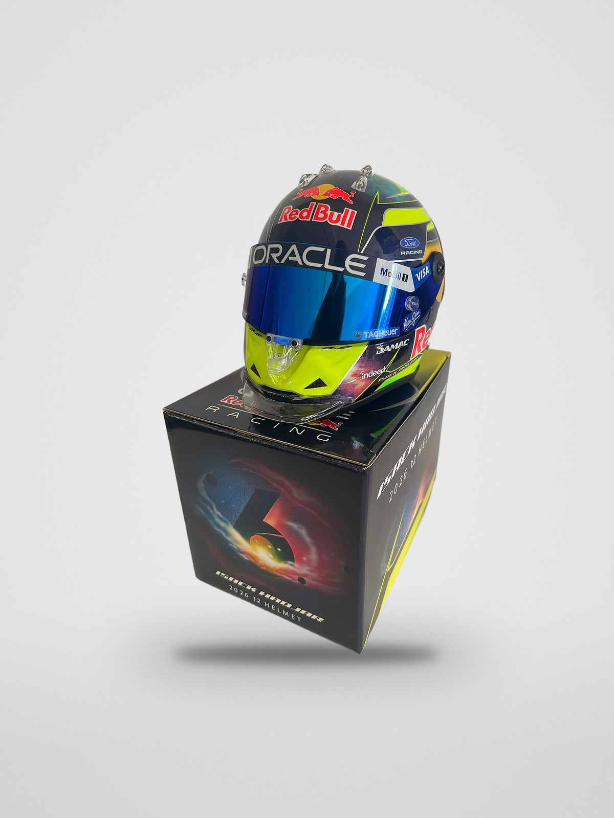 Isack Hadjar signed 2026 season mini helmet, 1:2 scale, on its Oracle Red Bull Racing box