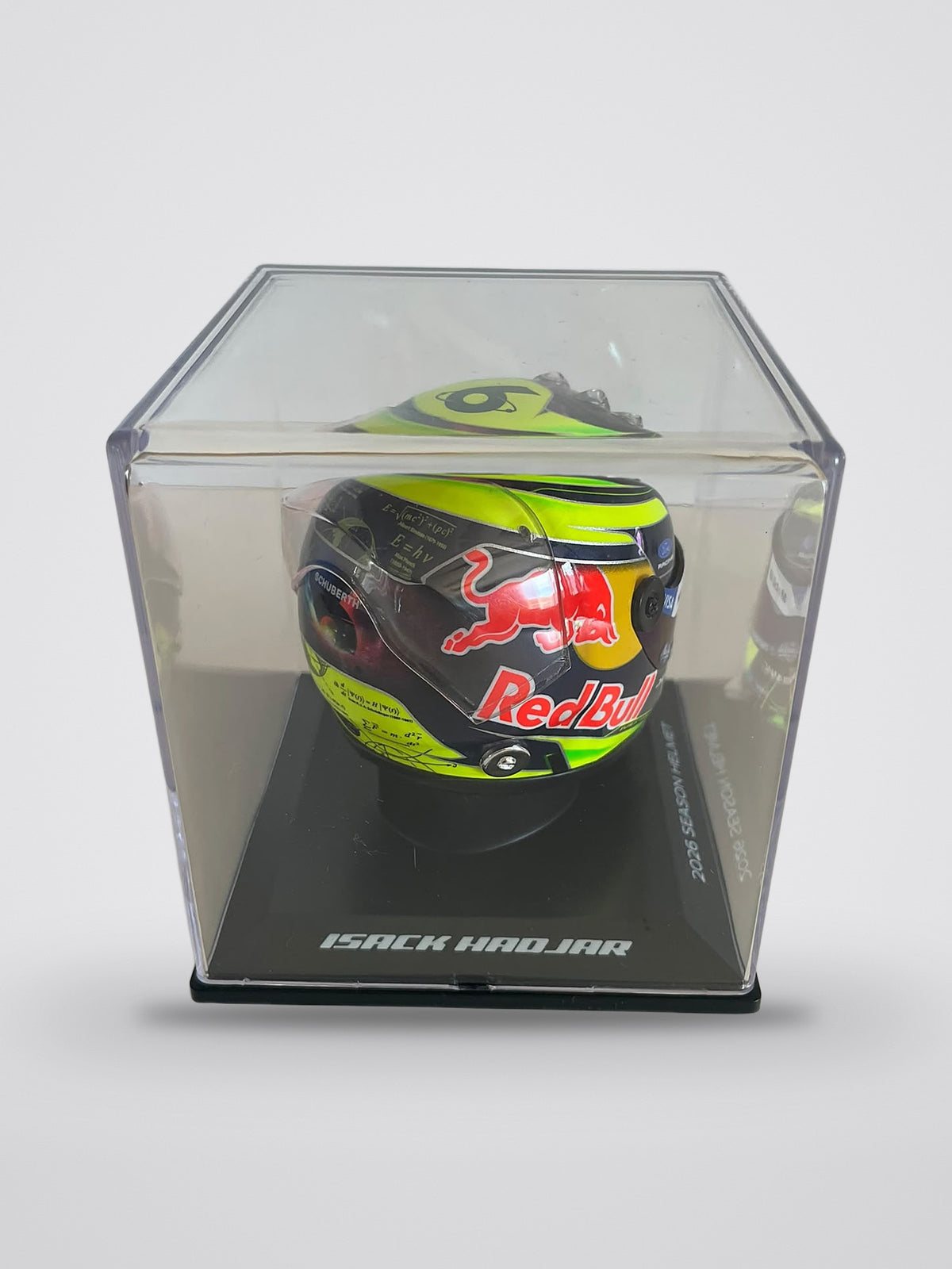 Isack Hadjar signed 2026 season mini helmet, 1:4 scale, back of the helmet in its display case: the physics equations